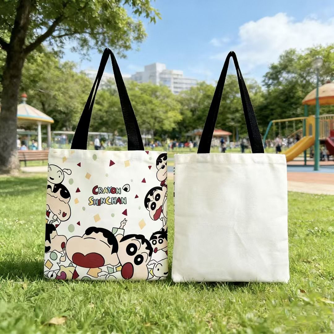 Women Bags 2026 - กระเป๋าผ้าแคนวาสลายชินจัง ปี 2026 รุ่นใหม่ ขนาดใหญ่ กระเป๋าสะพายข้างสำหรับผู้หญิง